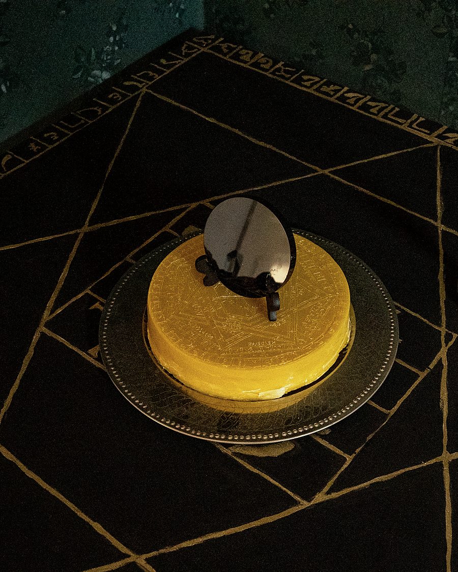 The Holy Table of Practice with the wax Sigillum and the black scrying mirror