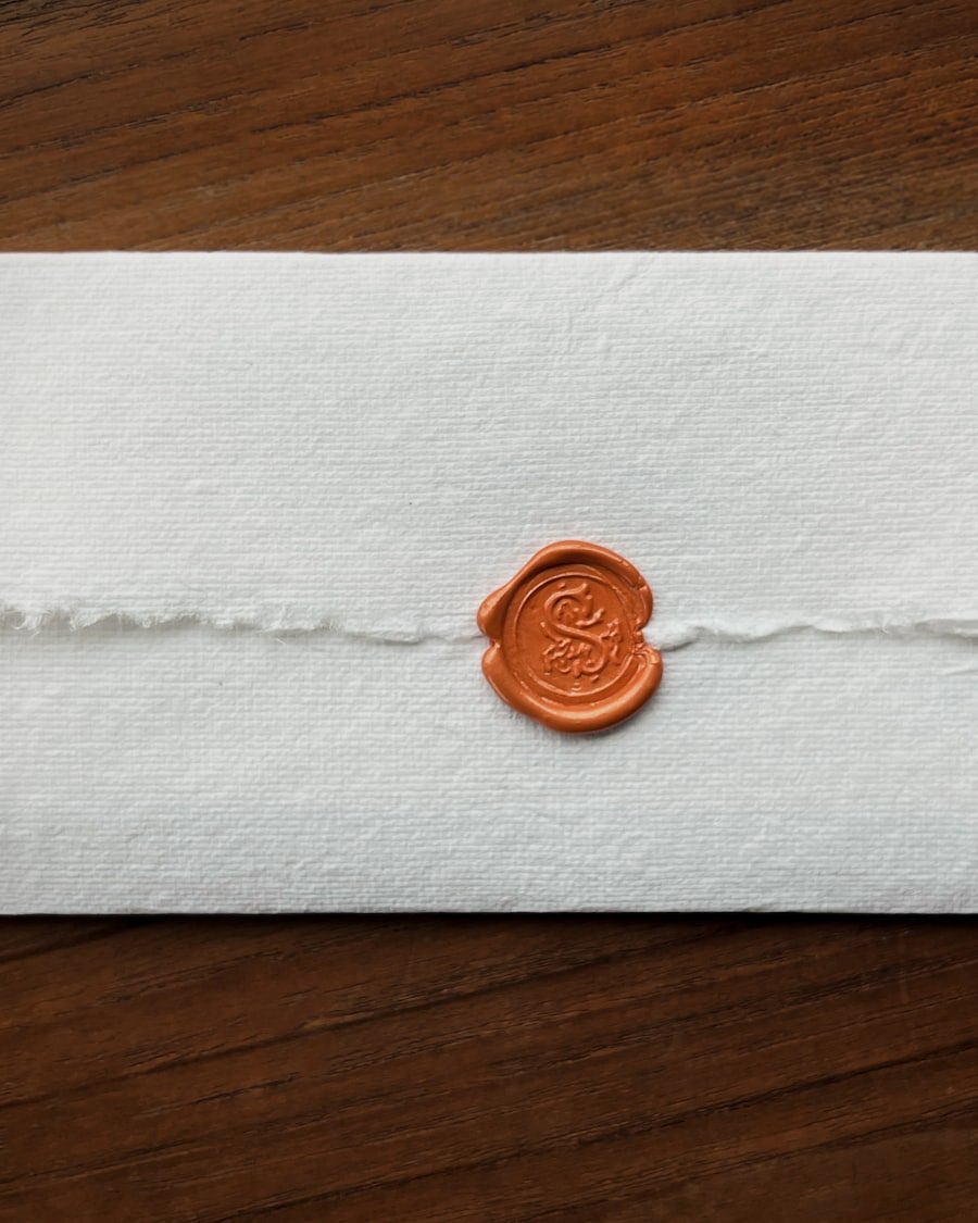 Beeswax seal on handmade paper